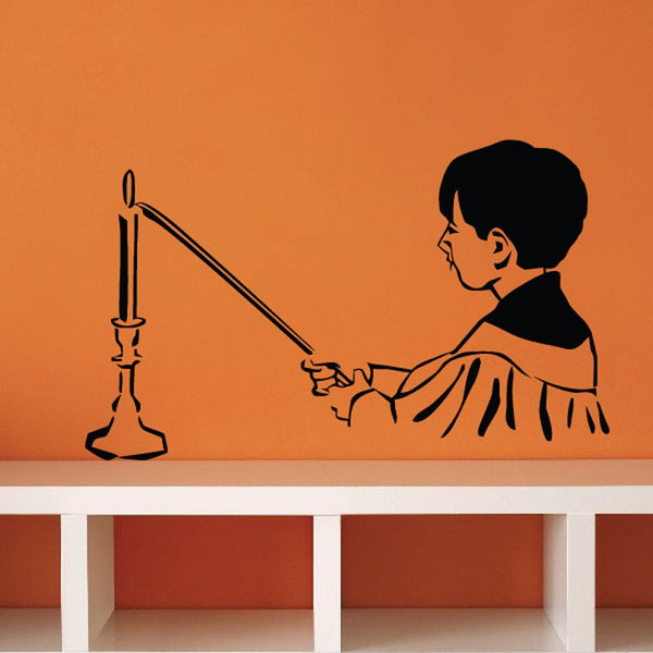 Altar boy wall decal of kneeling child holding a candle near candlestick