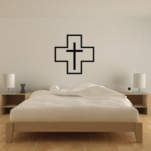 Medical symbol cross wall decal, black outline on light wall