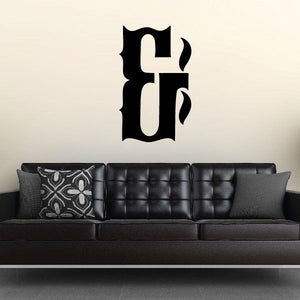 Black vinyl wall decal with stylized letter F symbol