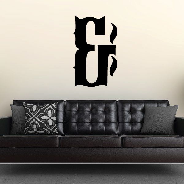 Black vinyl wall decal with stylized letter F symbol
