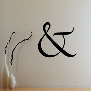 Ampersand wall decal in black vinyl with curvy lettering