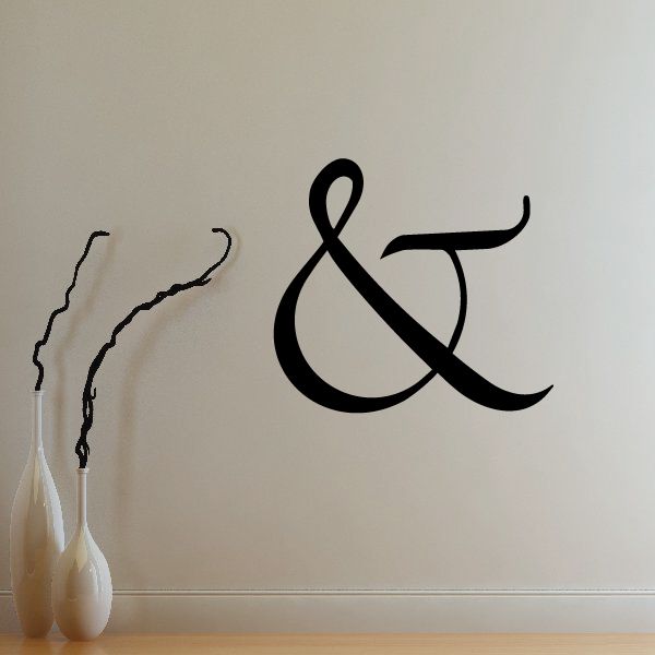 Ampersand wall decal in black vinyl with curvy lettering
