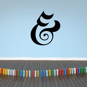 Black vinyl wall decal with decorative crescent swirl symbol