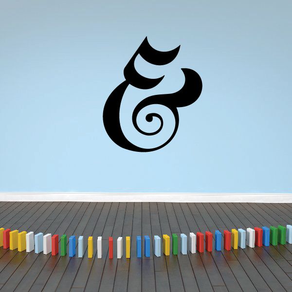 Black vinyl wall decal with decorative crescent swirl symbol