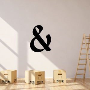 Black ampersand symbol wall decal in vinyl, business sign style.