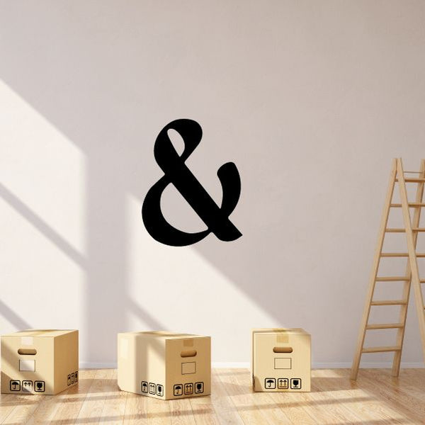 Black ampersand symbol wall decal in vinyl, business sign style.