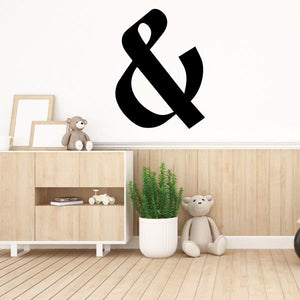 Black ampersand wall decal in bold vinyl lettering