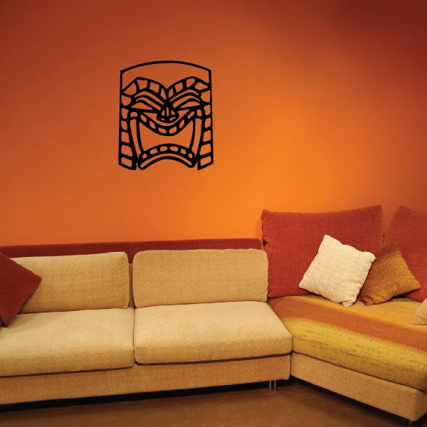Angry tiki mask decal, black line art with patterned face and mouth.