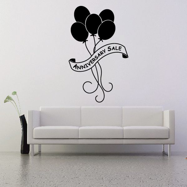 Anniversary sale vinyl wall decal of black balloons with banner and curls