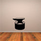 Black anvil on log wall decal