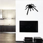 Black spider wall decal with long legs and raised front fangs