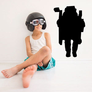 Astronaut walking decal sticker with black astronaut silhouette