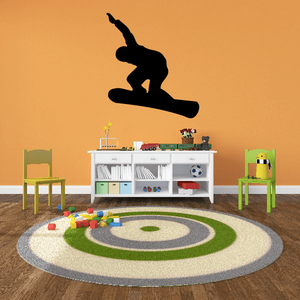 Black snowboarder silhouette wall decal, angled riding pose