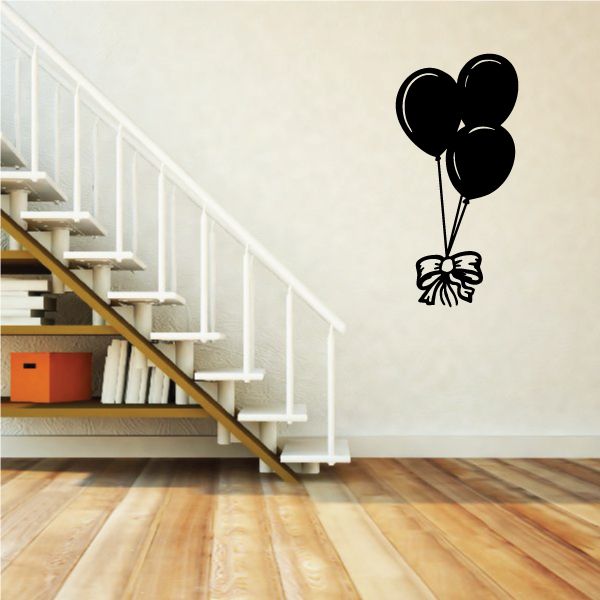 Black balloon decal with a tied bow and three balloons