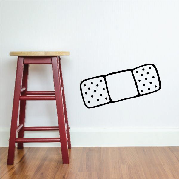 Bandage outline decal with black border and white pads with dotted detail