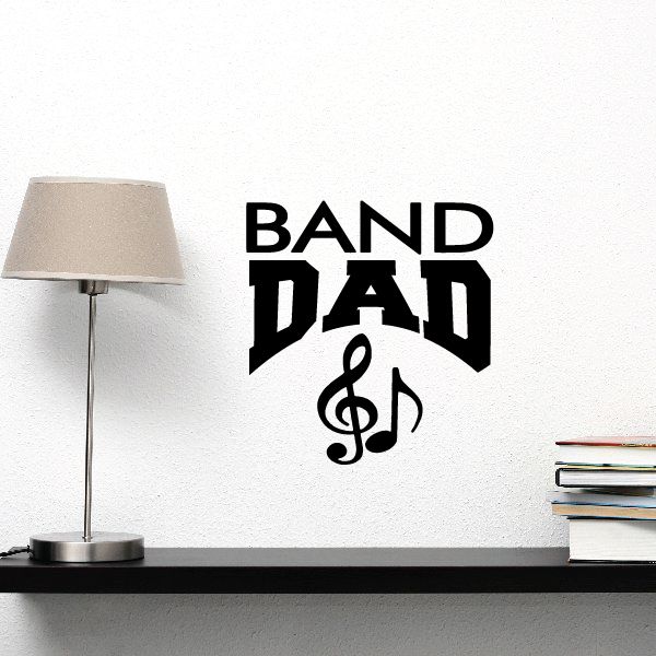 Band dad wall decal: black 'BAND DAD' text with treble clef icon
