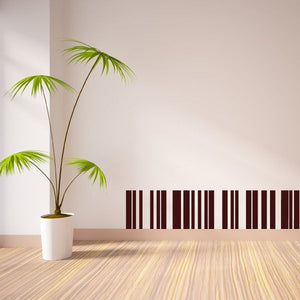 Horizontal barcode decal sticker with dark bars on light surface