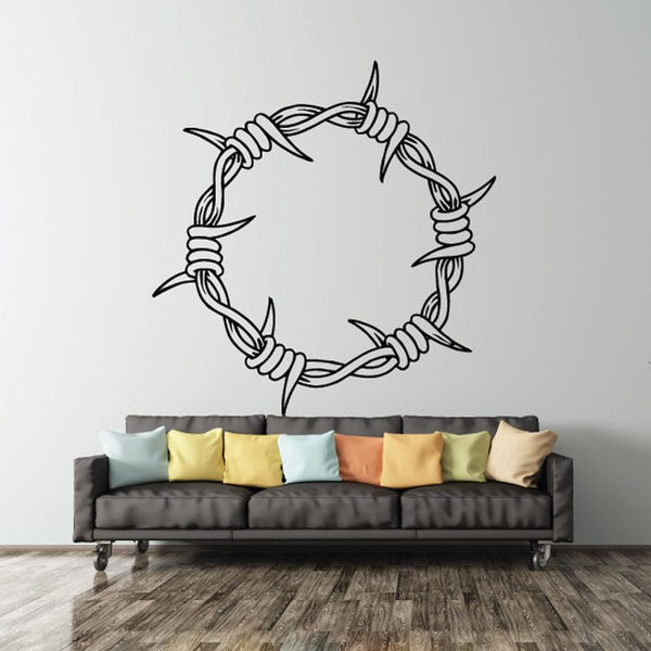 Circular barbed wire crown of thorns decal with black line-art wreath