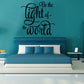 Inspirational wall decal with cursive text: “Be the light of the world”.