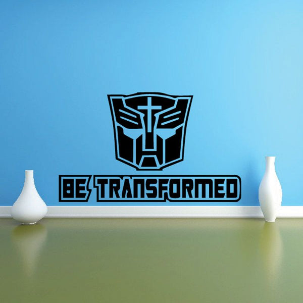 Black and blue Be Transformed wall decal with robot emblem and text.