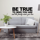 Wall decal with 'BE TRUE TO WHO YOU ARE' and cursive 'family name you bear'