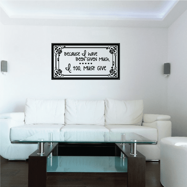 Wall quote decal with ornate black frame and cursive text on light background