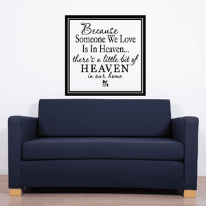 Wall decal quote in black script inside black frame, white background, small butterflies