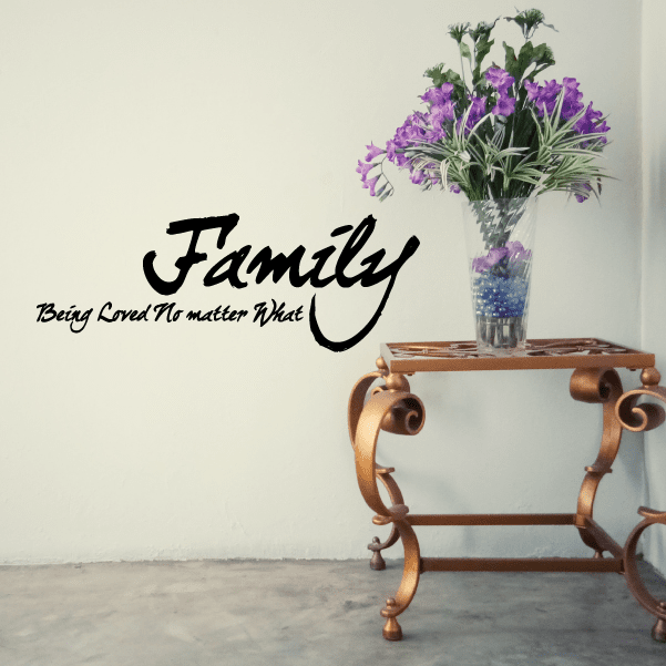 Black cursive wall decal reading 'Family' and 'Being Loved No matter What'.