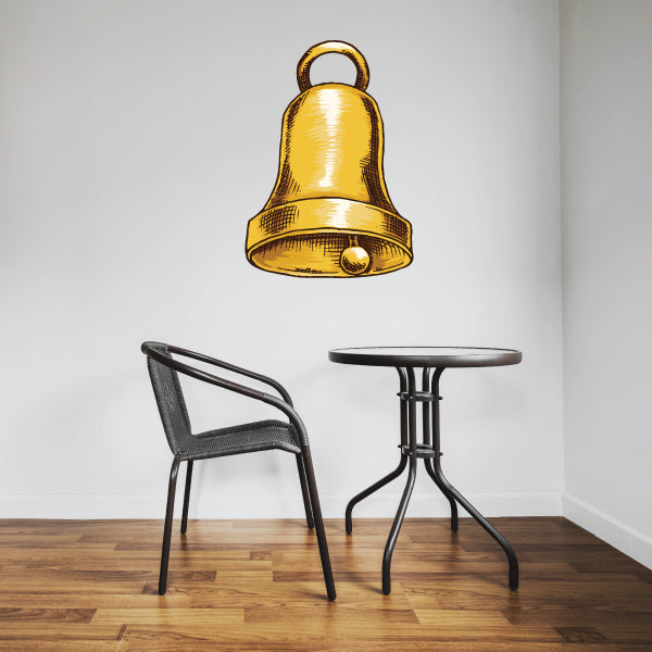 Polished golden Christmas bell sticker with hanging loop and glossy finish