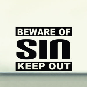 Black warning decal: 'BEWARE OF SIN KEEP OUT' text