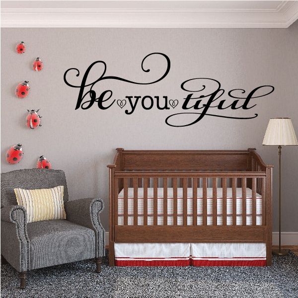 Cursive wall decal reading 'be you tiful' with heart accents