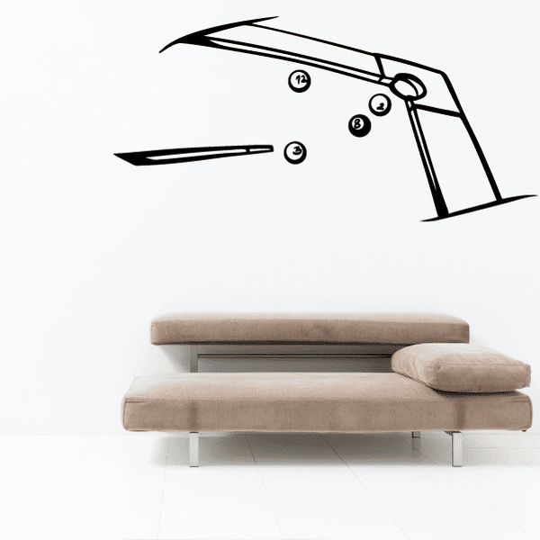 Corner table with billiards balls decal: black pool cue and ball graphic above beige sofa