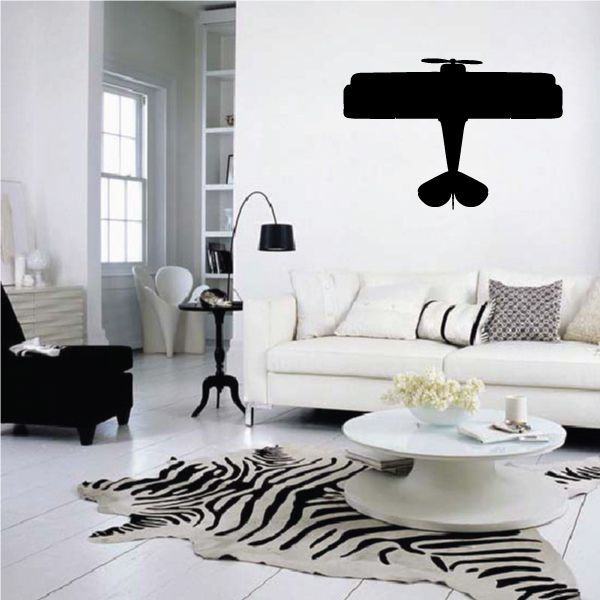 Black biplane airplane silhouette wall decal with propeller and wings