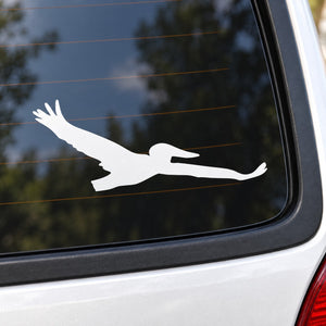 White flying pelican vinyl decal silhouette on car window glass