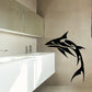Abstract shark wall decal, black stylized blade-like body and fins.