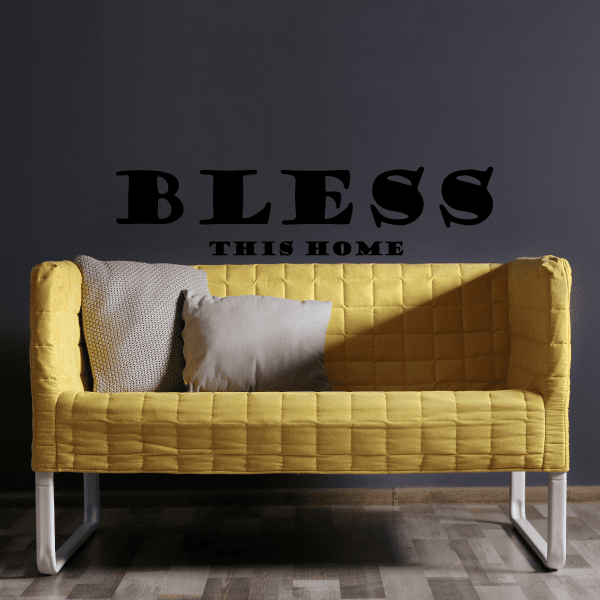 Wall decal with 'BLESS THIS HOME' lettering in black, centered on dark background