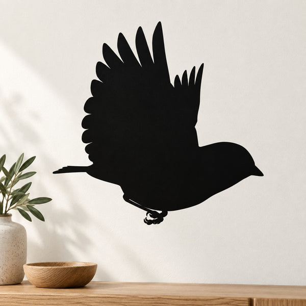 Black bird silhouette wall decal with wings spread and tail extended