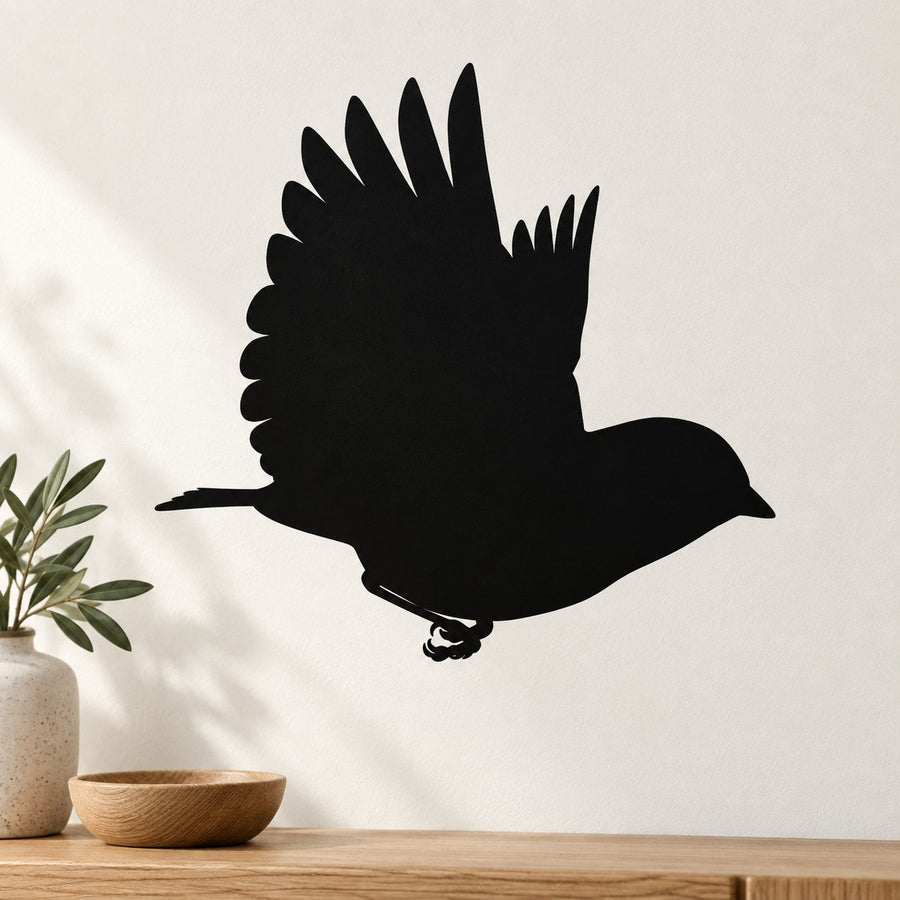 Black bird silhouette wall decal with wings spread and tail extended