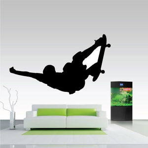 Skateboarding grab decal with black skateboarder silhouette