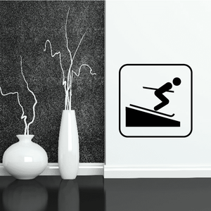Skier sign decal: black bombing skier icon in a rounded square frame