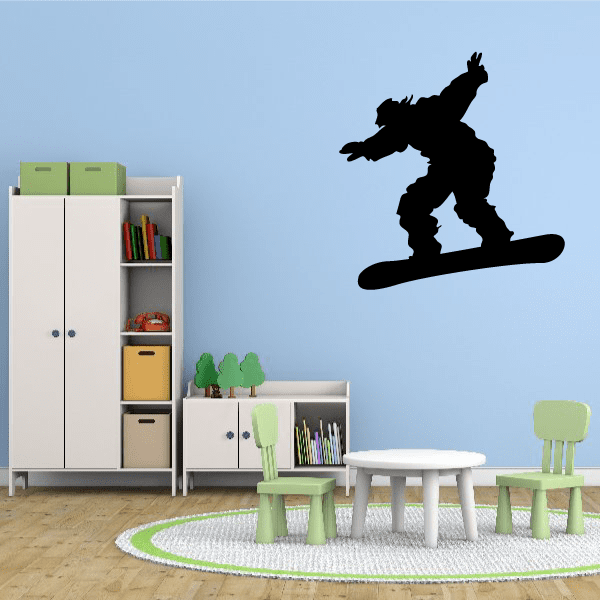 Snowboarding wall decal featuring black snowboarder silhouette