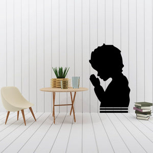 Boy praying before supper wall decal, black silhouette with stacked lines base