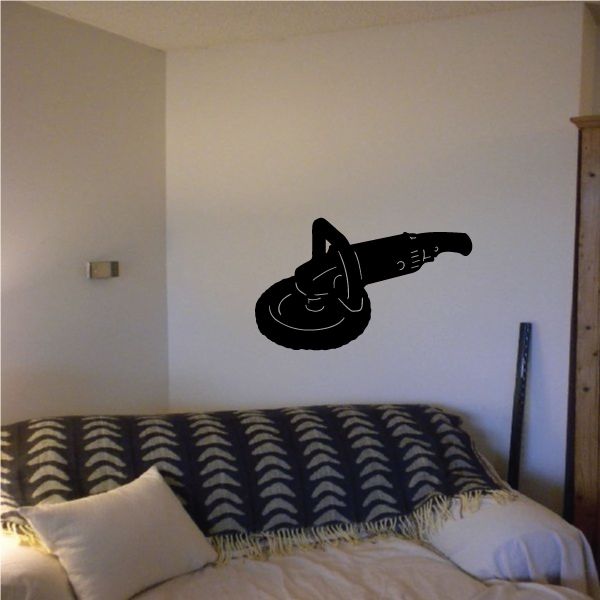 Black guitar wall decal with round base and pointed head silhouette