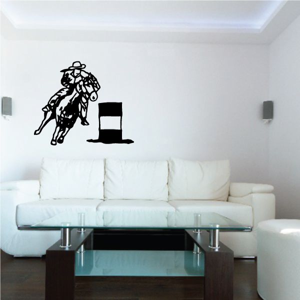 Bull riding cowboy wall decal, black vinyl silhouette on white wall