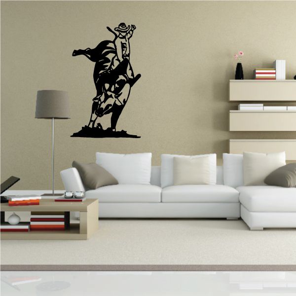Bull riding wall decal, black vinyl silhouette of cowboy on a bull
