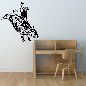Bull riding wall decal with black vinyl silhouette of rider on bull