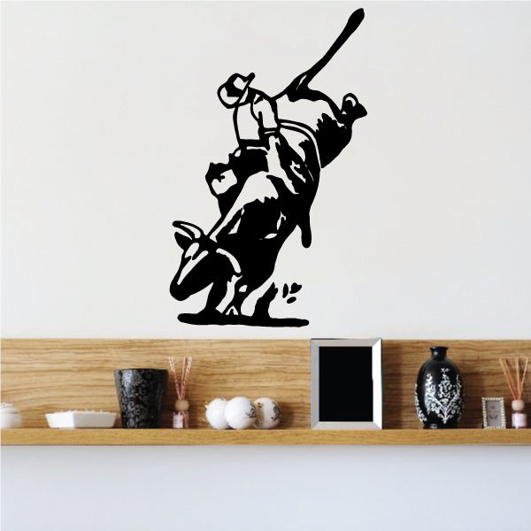 Bull riding wall decal, black silhouette of rider and bull