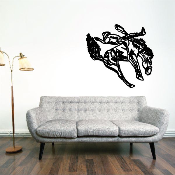 Bull riding wall decal with black bull rider silhouette