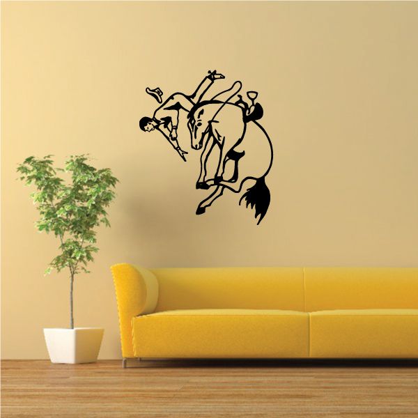 Bull riding wall decal in vinyl with black cowboy-on-bull silhouette