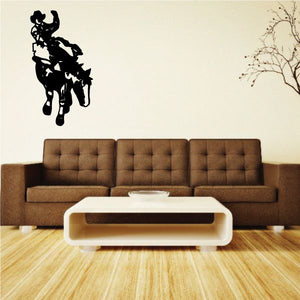 Bull riding vinyl wall decal with black rider silhouette